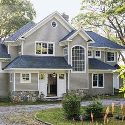 large residential home in wooded area