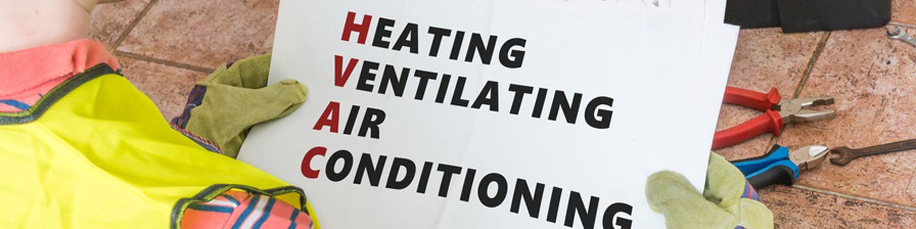 man holding hvac sign